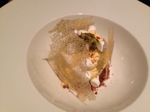 Aerated passionfruit, roasted nougatine, passionfruit ice cream, passionfruit seed powder, glass biscuit