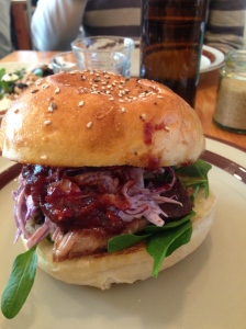 Kentucky Derby - Toasted sesame bun, citrus slow cooked pork shoulder, red cabbage slaw, spinach, house made barbeque sauce, mayonnaise
